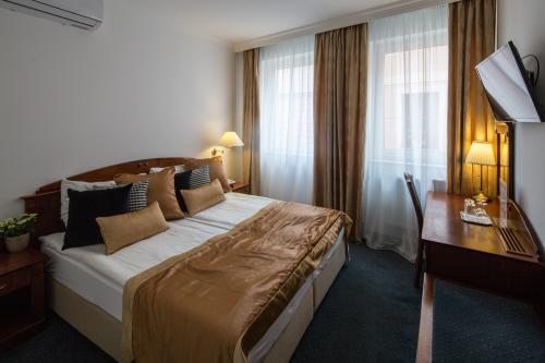 Goedkope accommodatie in Gyor - Tweepersoonskamer in het Hotel en restaurant Fonte in de historische binnenstad van Gyor