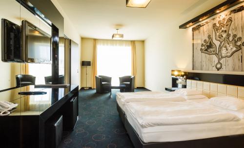 Sypialnia Hotelu Gotthard - elegancja i przyjemność na Węgrzech