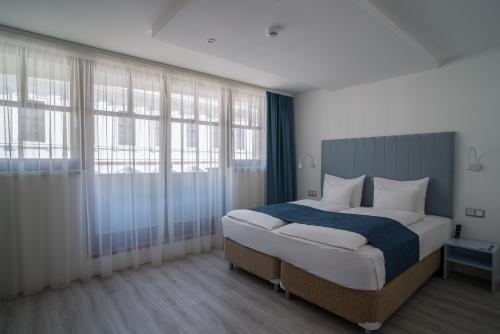 Boutique Hôtel Civitas - la chambre supérieure au centre de Sopron en Hongrie